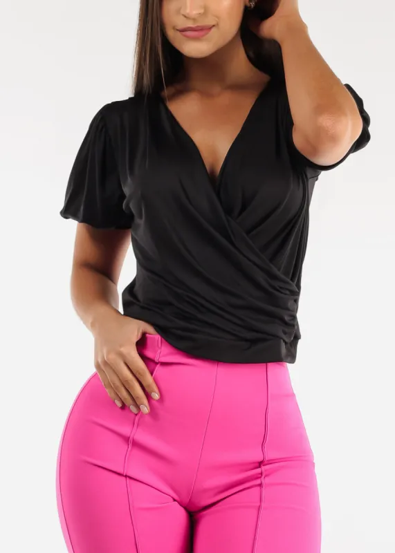 Black Short Puff Sleeve Surplice Top sold by Moda