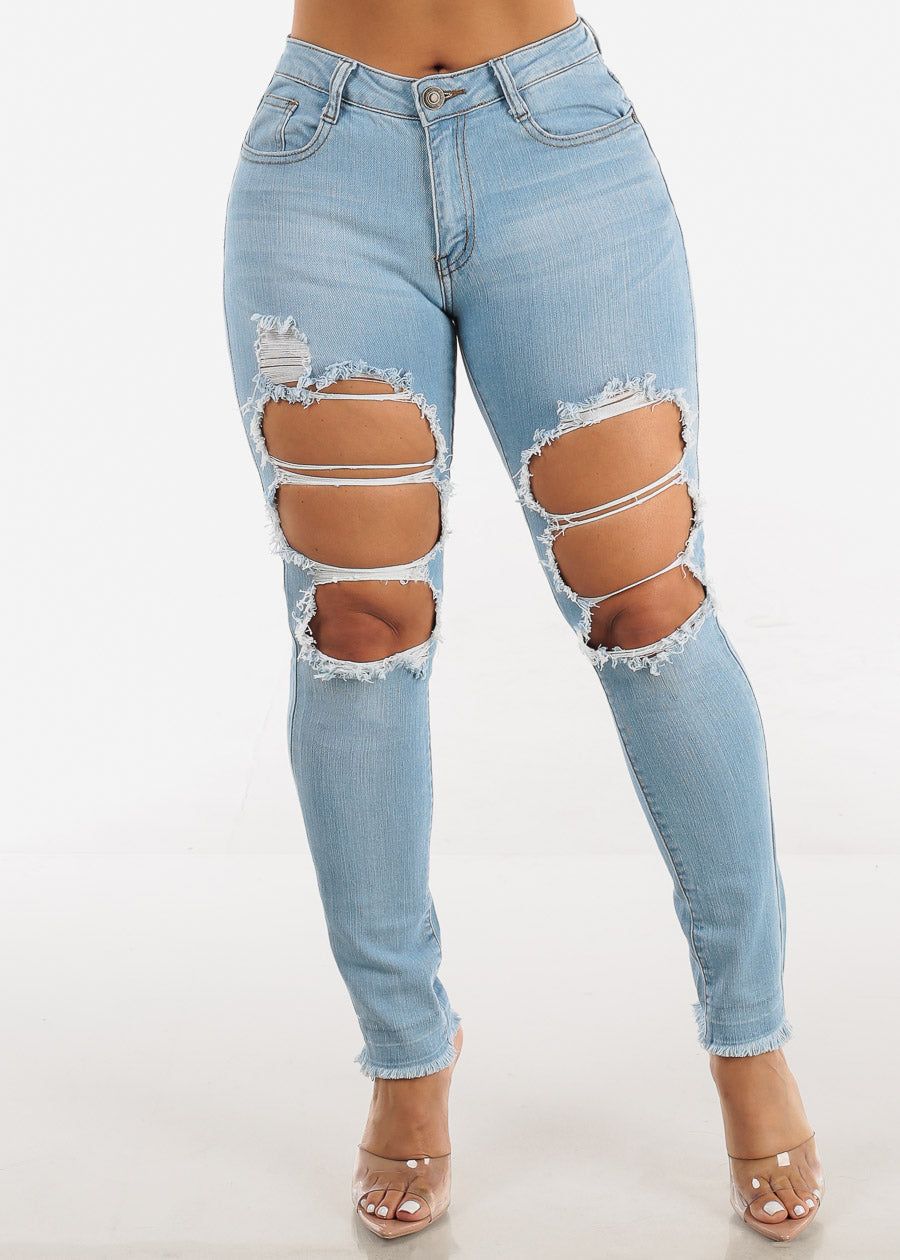 Distressed Mid Rise Light Blue Skinny Jeans sold by Moda