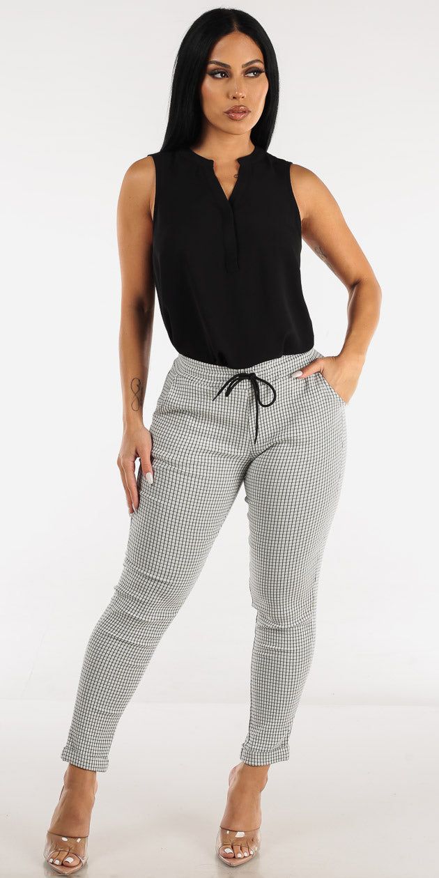 Drawstring Waist White Printed Dressy Pants with Sleeveless Vneck Black Blouse sold by Moda