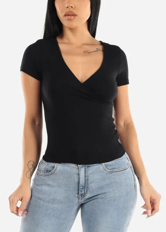 Black Short Sleeve Surplice Ribbed Top sold by Moda