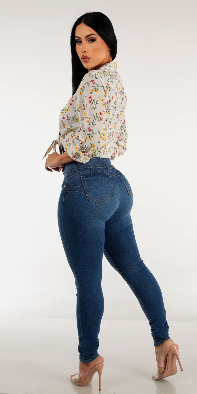Butt Lift Mid Rise Med Wash Skinny Jeans with White Tie Front Button Up Floral Blouse sold by Moda product image thumbnail 2