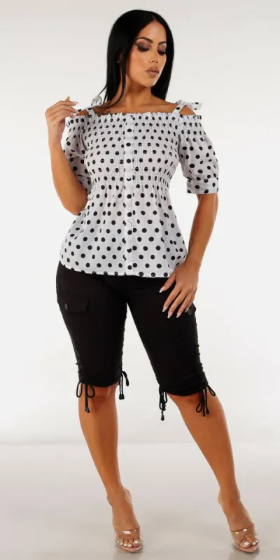 Black High Rise Cargo Bermuda Shorts with White Cold Shoulder Polka Dot Top sold by Moda