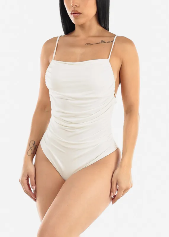 White Shirred Backless Cami Bodysuit sold by Moda
