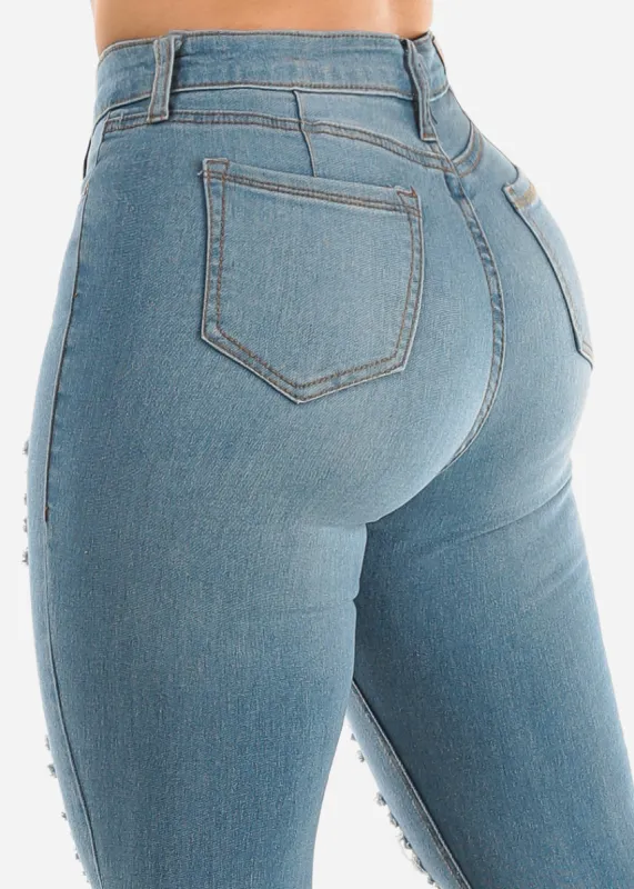 Butt Lifting Distressed Mid Rise Light Skinny Jeans sold by Moda