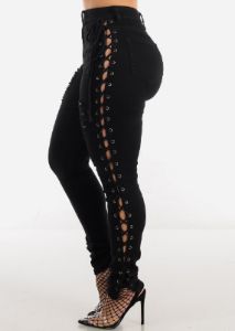 Distressed Black Skinny Jeans with Lace Up Sides sold by Moda