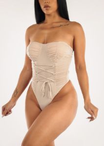 Nude Strapless Thong Bodysuit w Lace Up Front sold by Moda