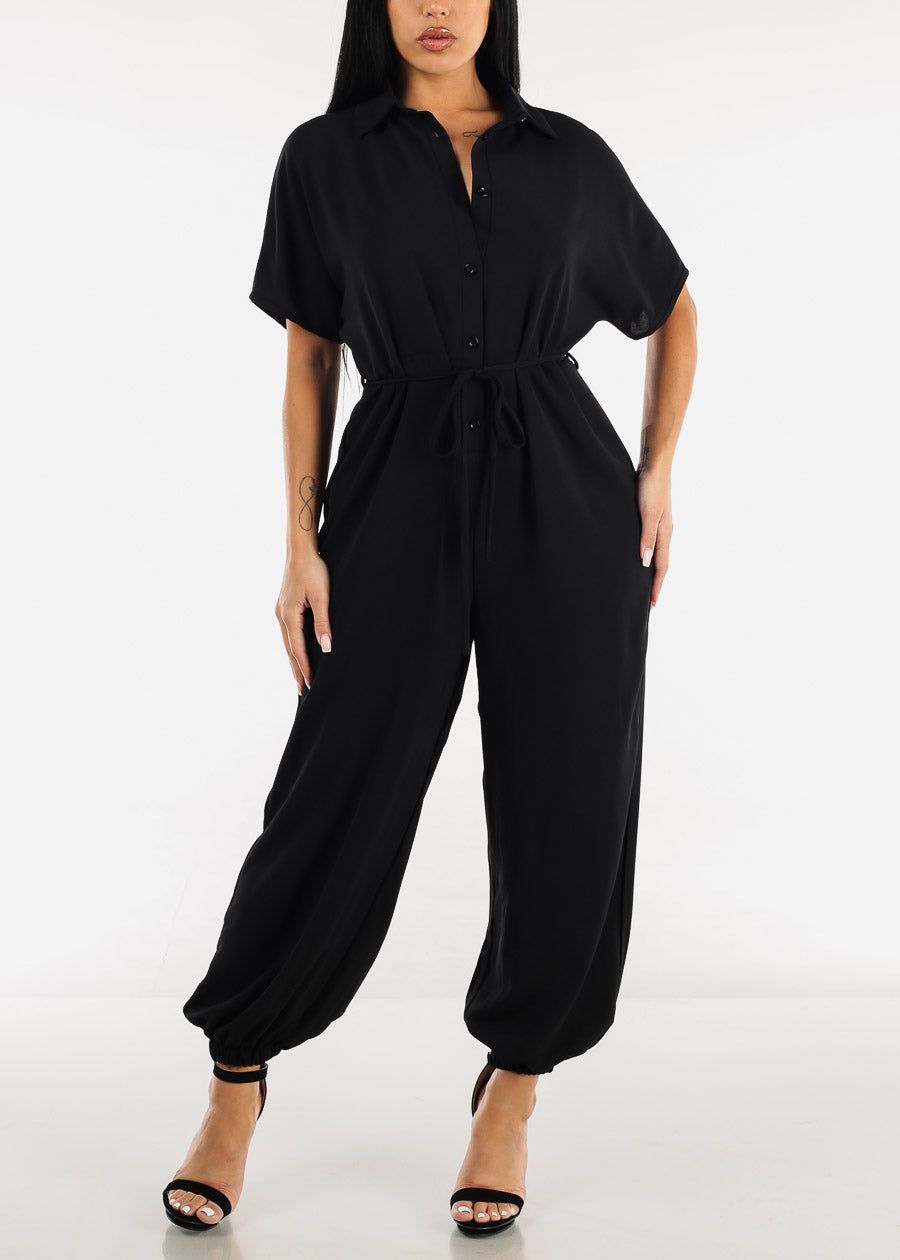 Black Short Sleeve Tie Waist Button Up Jumpsuit sold by Moda