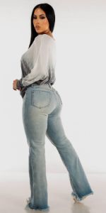High Rise Light Blue Wide Legged Denim Jeans with White Long Sleeve Printed Tunic Top sold by Moda