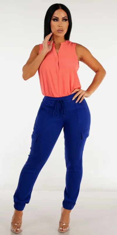 Blue Hyper Stretch Cargo Joggers with Sleeveless Vneck Coral Blouse sold by Moda