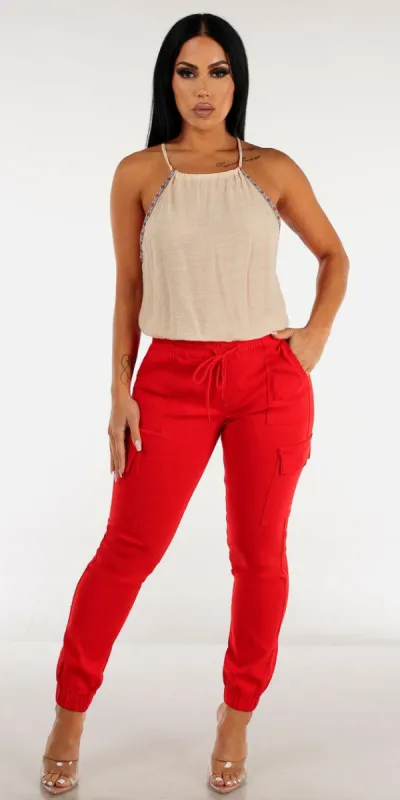 Red Drawstring Waist Cargo Joggers with Sleeveless Halter Cream Top sold by Moda