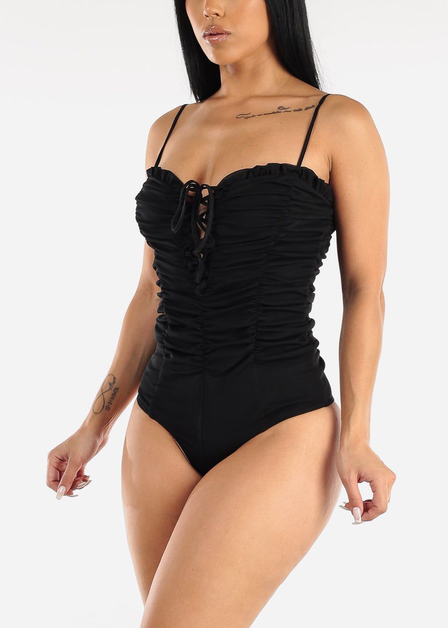 Sleeveless Lace Up Ruched Black Bodysuit sold by Moda
