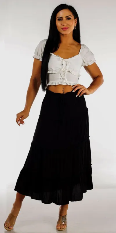 Black Ruffle Tiered Maxi Skirt with White Ruffled Lace Up Crop Top sold by Moda