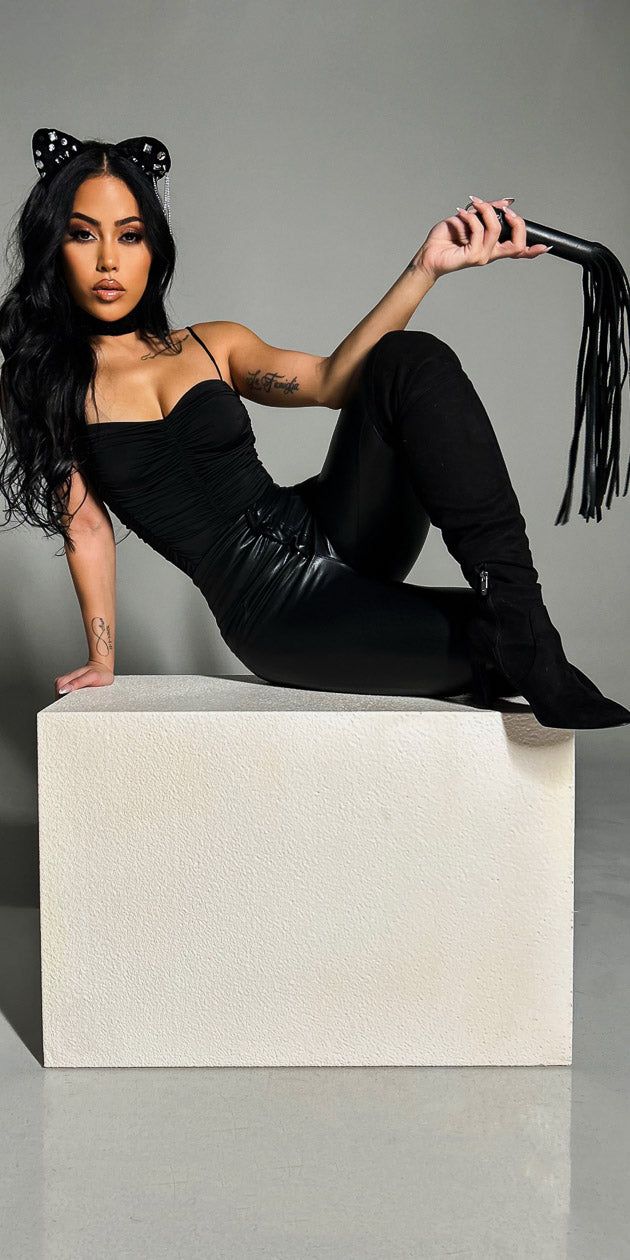 Black Butt Lifting Pleather Skinny Pants with Sleeveless Ruched Black Bodysuit sold by Moda