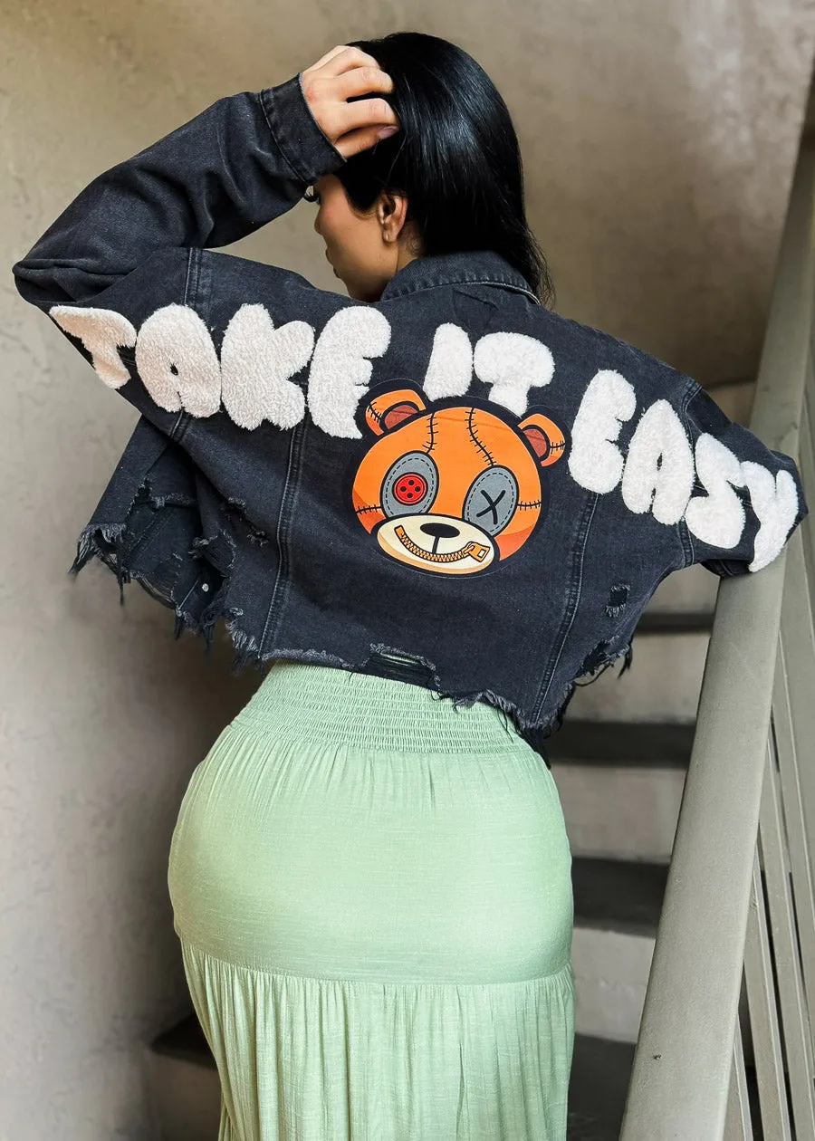 Black Graphic Cropped Denim Jacket "Take It Easy" sold by Moda
