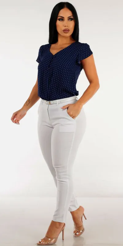 Mid Rise White Belted Dress Pants with Short Sleeve Navy Polka Dot Blouse sold by Moda