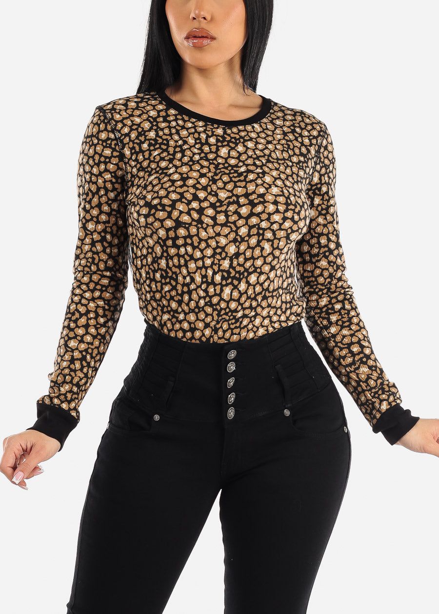 Long Sleeve Crewneck Animal Print Top Black sold by Moda