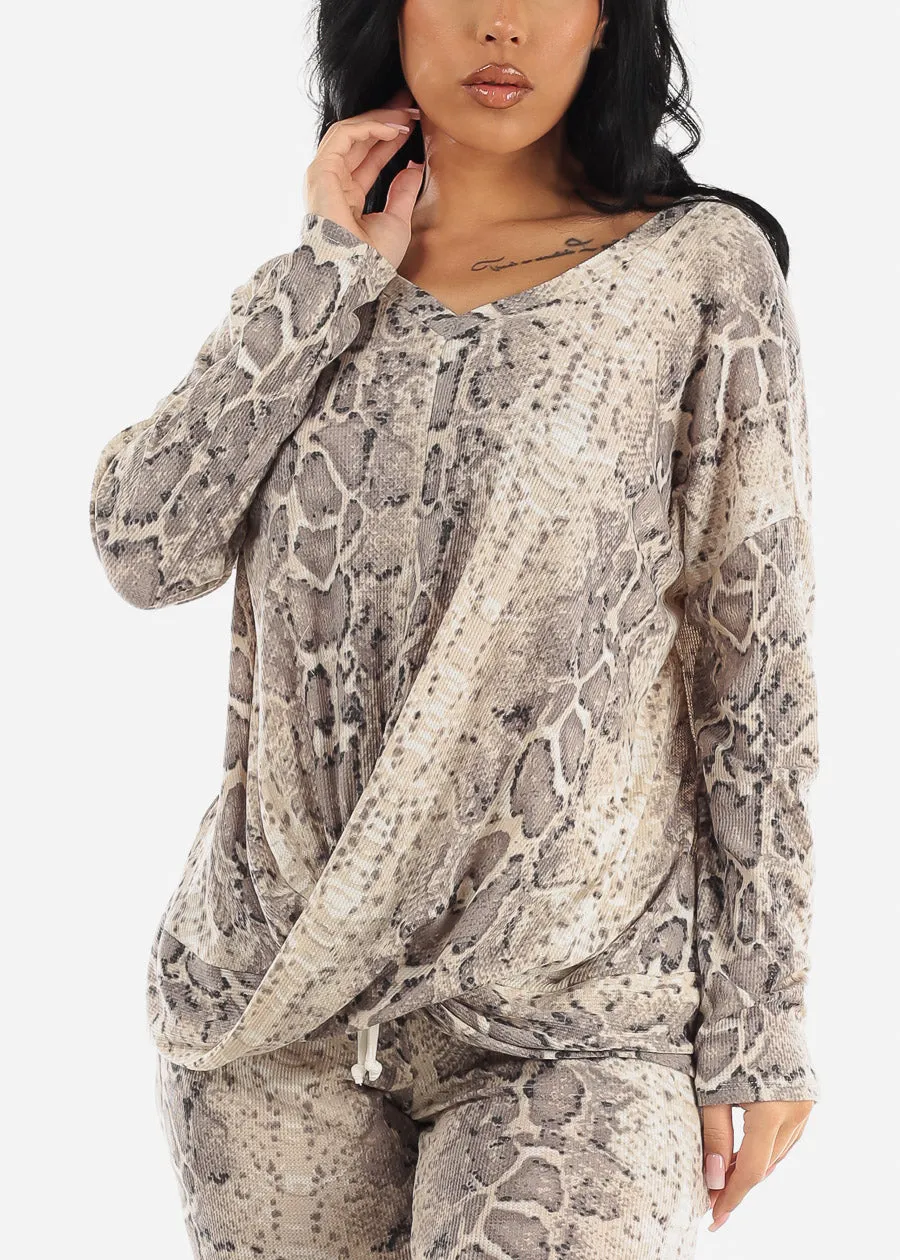 Long Sleeve Twist Front Snake Print Tunic Top sold by Moda