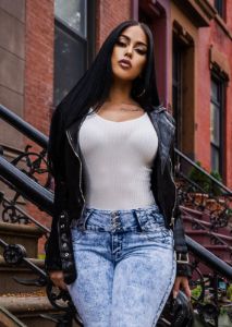 Ivory Ribbed Knit Bodysuit sold by Moda