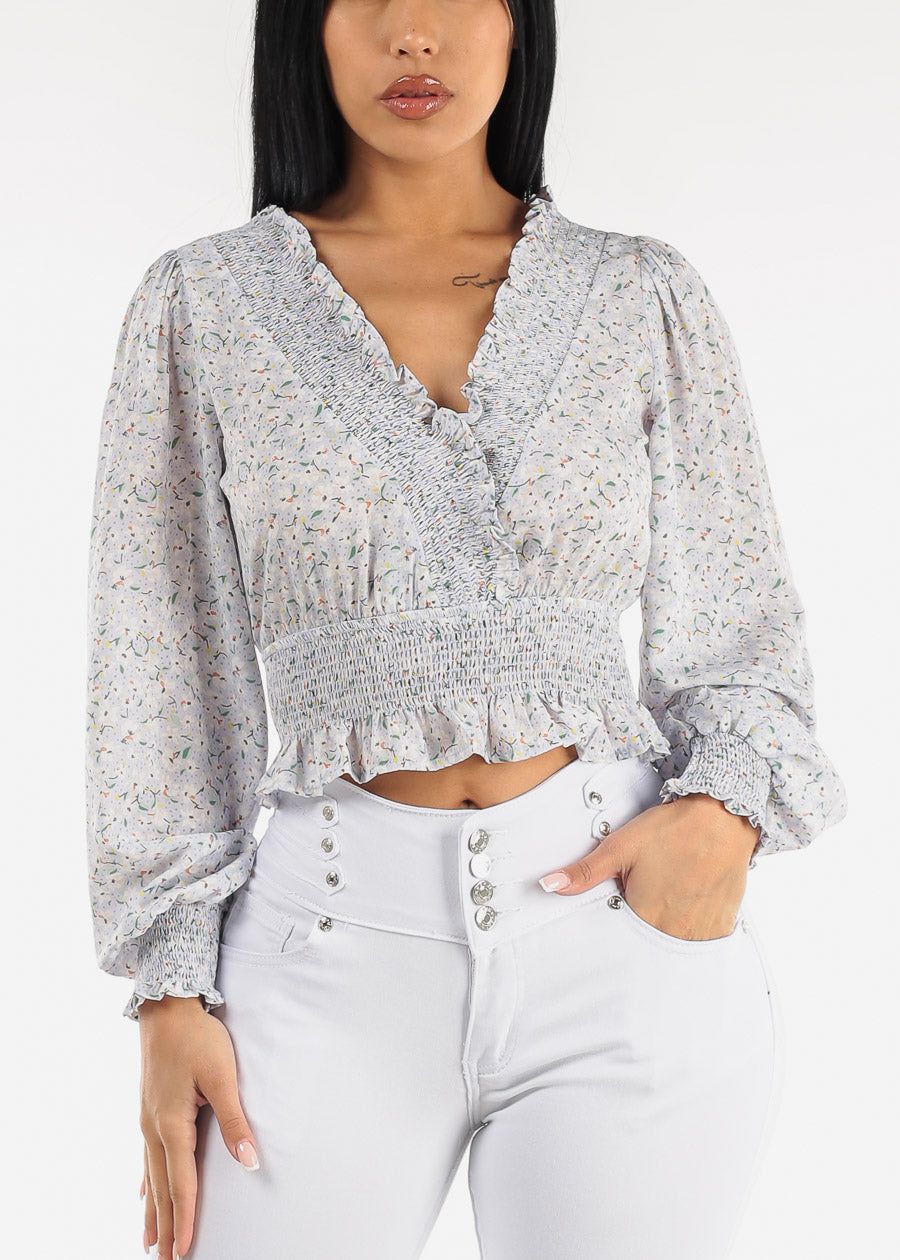 Long Sleeve Floral Surplice Smocked Top Blue sold by Moda