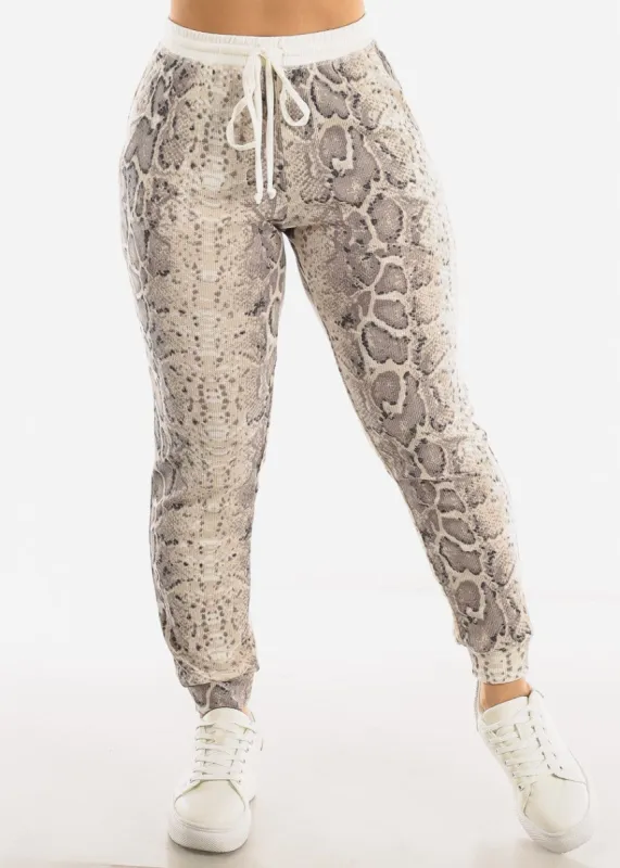 High Drawstring Waist Snake Print Jogger Pants made by Moda