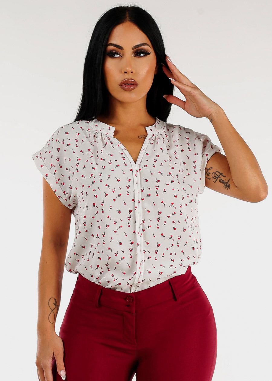 White Cap Sleeve Vneck Floral Blouse sold by Moda