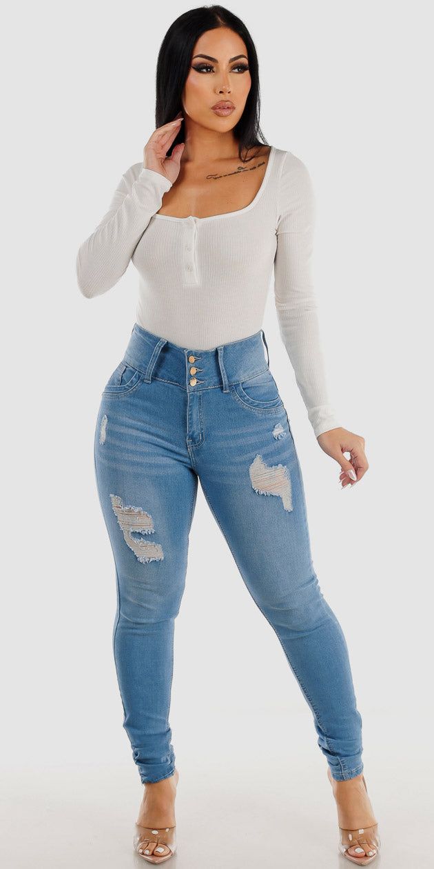 Light Blue Levantacola Distressed Skinny Jeans with White Long Sleeve Thong Bodysuit sold by Moda