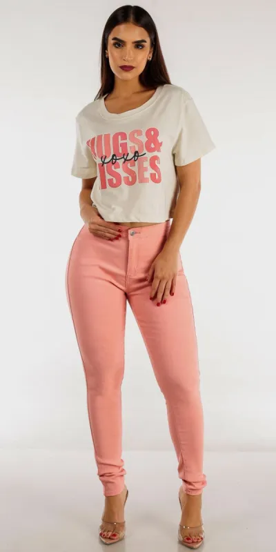 Mauve High Rise Hyper Stretch Skinny Pants with Short Sleeve Graphic Cream Crop Top sold by Moda