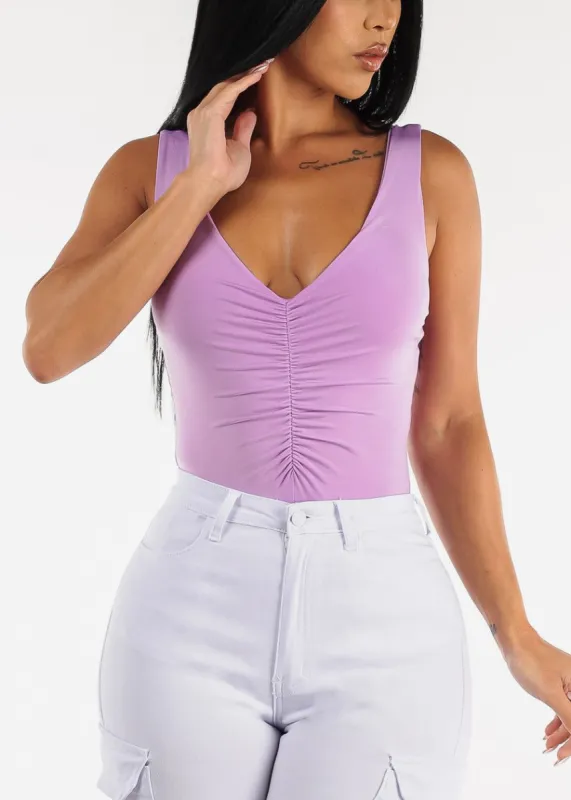 Sleeveless Deep Vneck Ruched Bodysuit Lilac sold by Moda