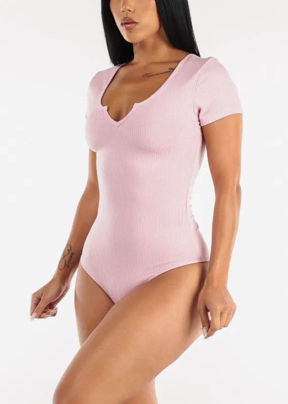 Short Sleeve Notched Ribbed Bodysuit Pink sold by Moda