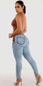 High Waisted Acid Wash Skinny Jeans with Sleeveless Ruched Sides Mesh Top sold by Moda