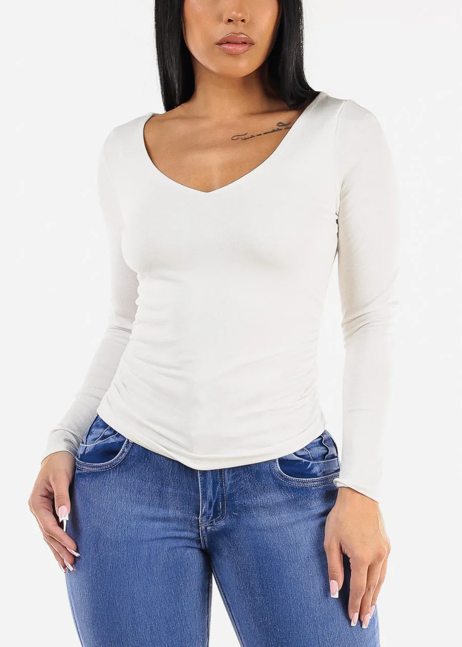 Long Sleeve Vneck White Top w Ruched Sides sold by Moda