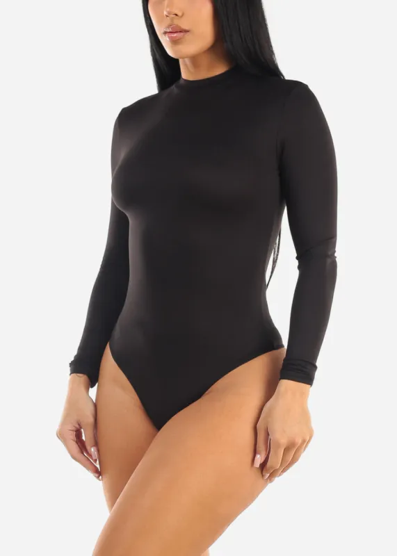 Black Long Sleeve Mock Neck Thong Bodysuit sold by Moda