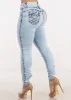 MX JEANS Butt Lift Mid Rise Light Acid Wash Skinny Jeans sold by Moda