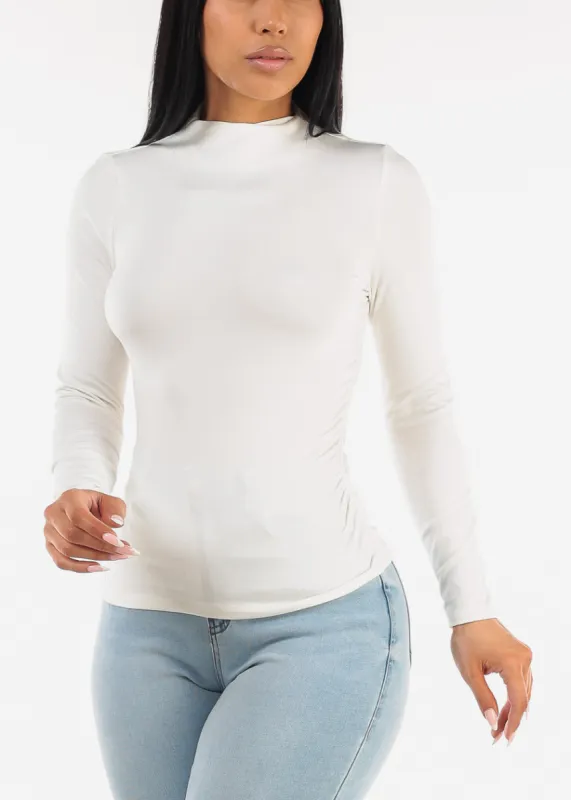 Long Sleeve Mock Neck Ruched Top White sold by Moda