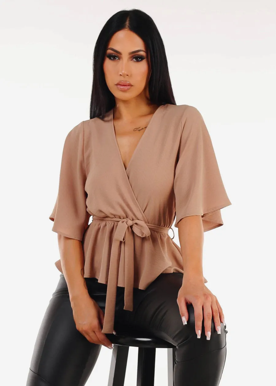 Short Sleeve Surplice Peplum Blouse Taupe sold by Moda