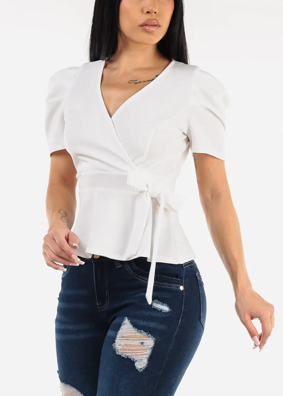 White Short Sleeve Surplice Peplum Blouse sold by Moda
