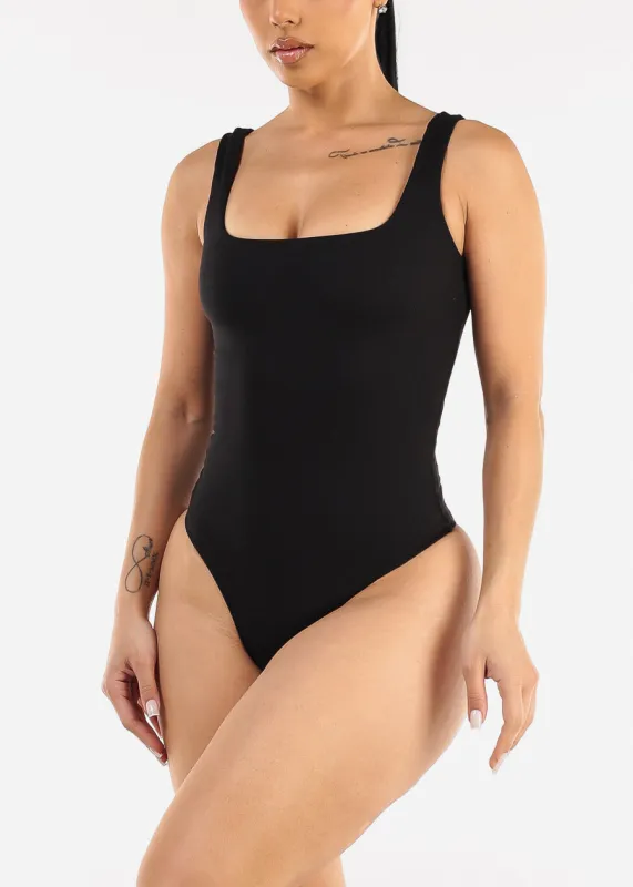 Black Wide Square Neck Ribbed Thong Bodysuit sold by Moda