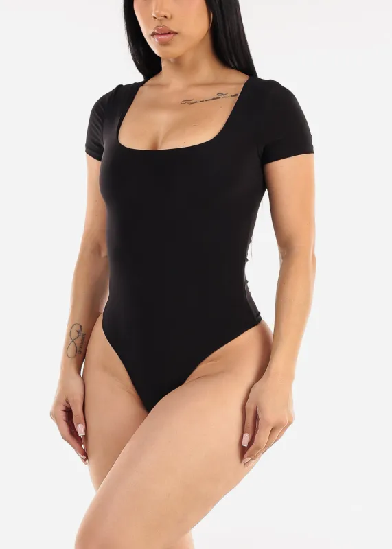 Black Short Sleeve Square Neck Stretch Thong Bodysuit sold by Moda