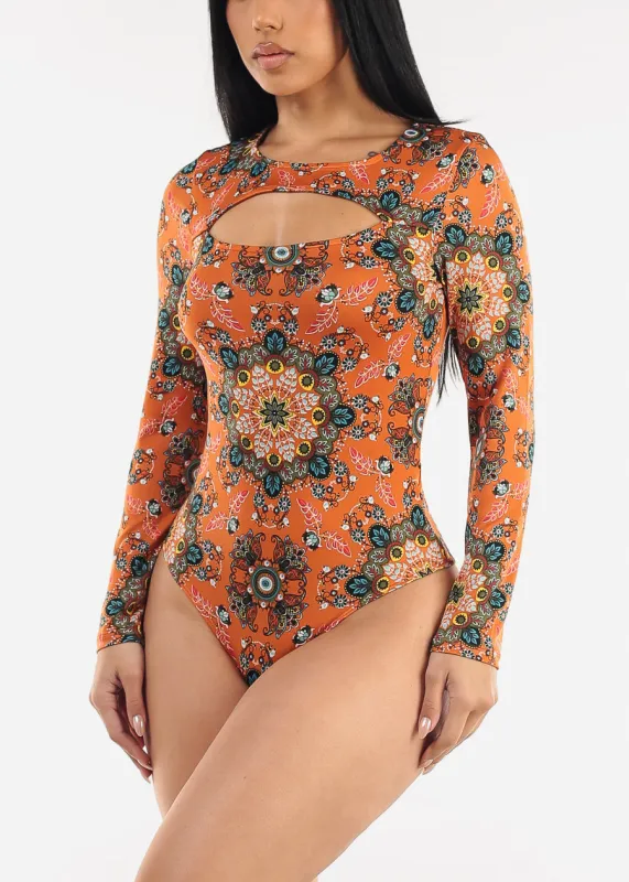 Long Sleeve Floral Stretch Thong Bodysuit Rust sold by Moda