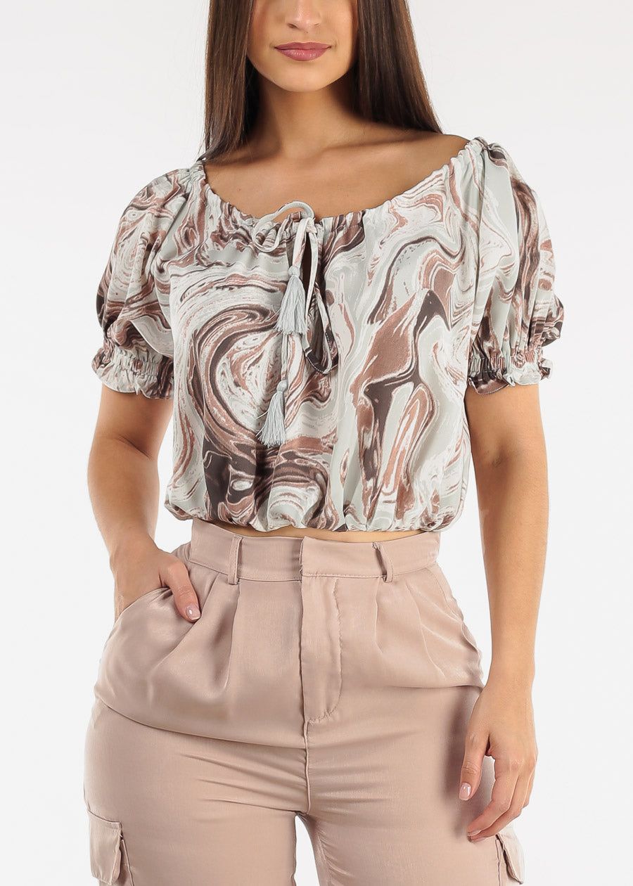 Off Shoulder Marble Print Top w Tassel Detail sold by Moda