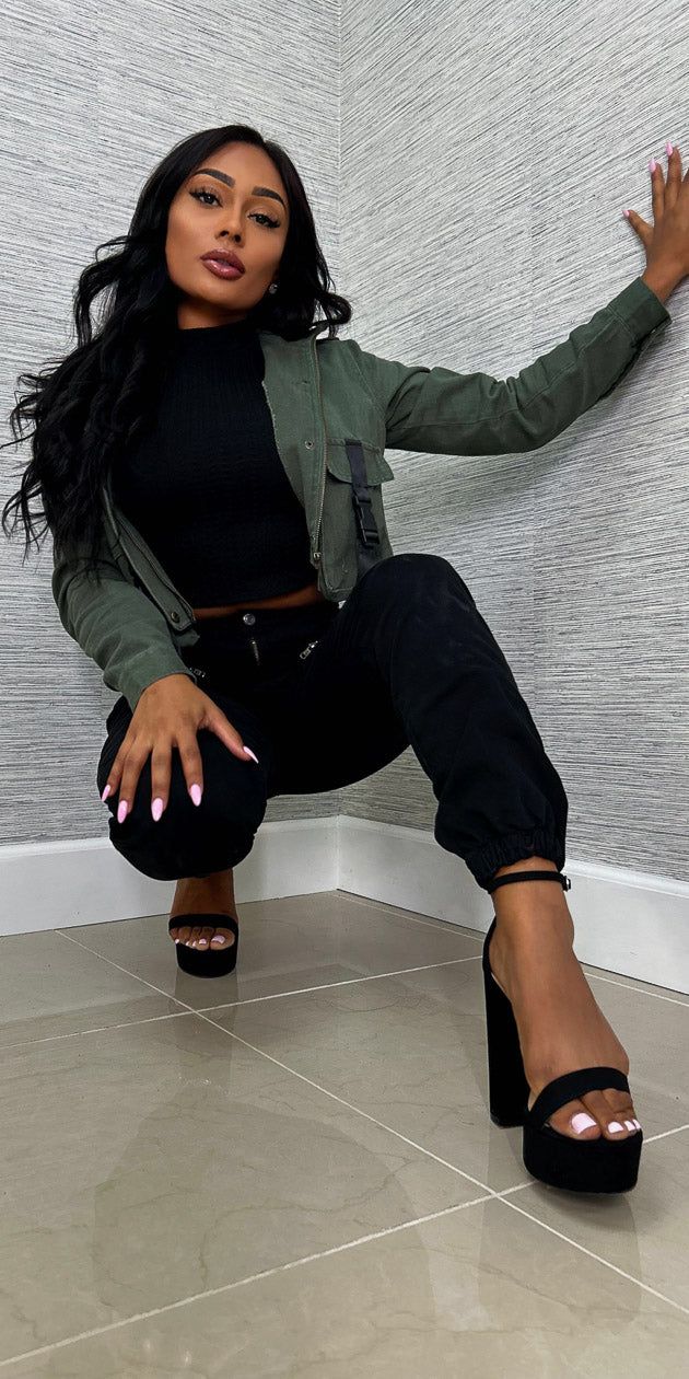 Black Cargo Jogger Pants Black Sleeveless Mock Neck Crop Top and Olive Cropped Cargo Jacket sold by Moda