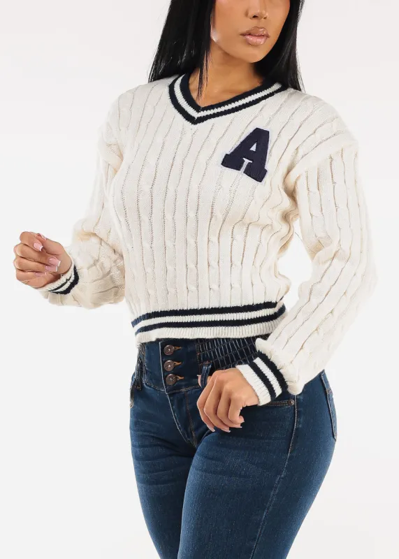 Long Sleeve Vneck Varsity Cable Knit Sweater Cream sold by Moda