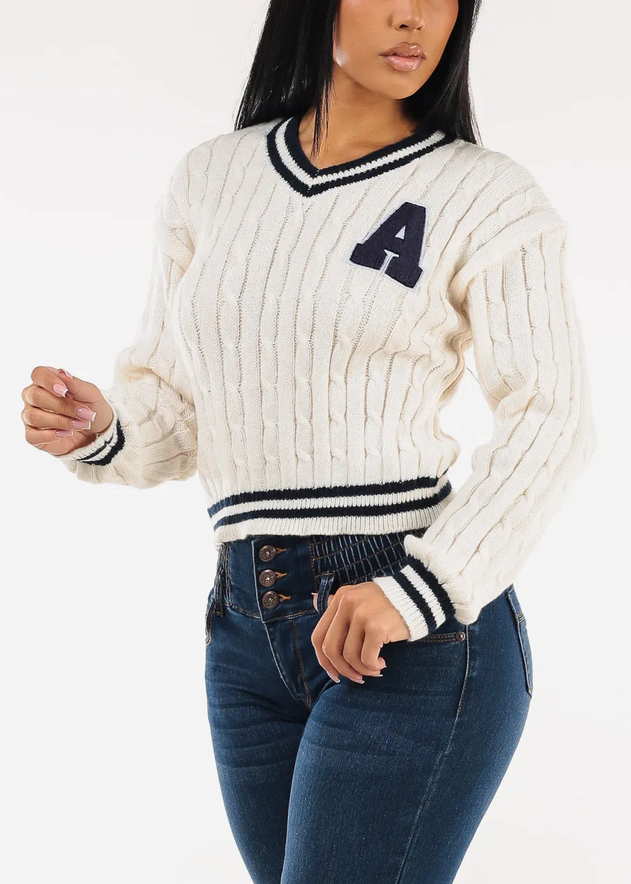 Long Sleeve Vneck Varsity Cable Knit Sweater Cream sold by Moda