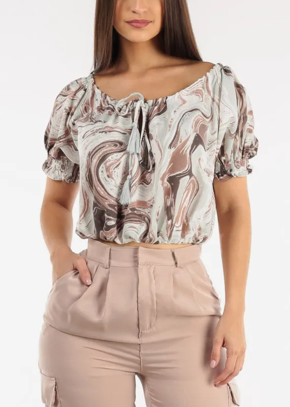 Off Shoulder Marble Print Top w Tassel Detail sold by Moda
