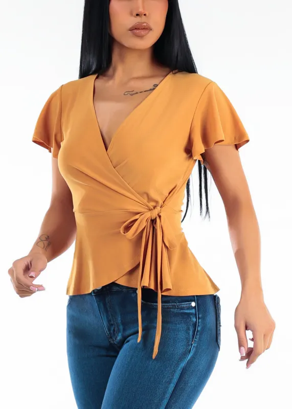Short Sleeve Surplice Stretch Peplum Blouse Mustard made by Moda