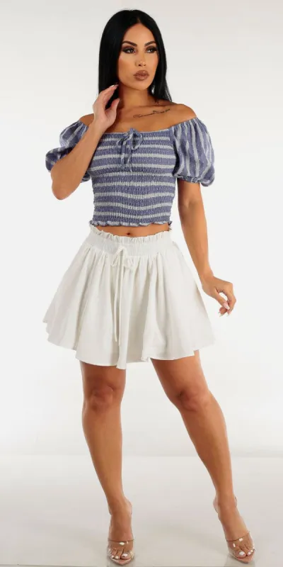 High Rise Smocked Waist White Flared Shorts with Off Shoulder Printed Smocked Denim Crop Top sold by Moda