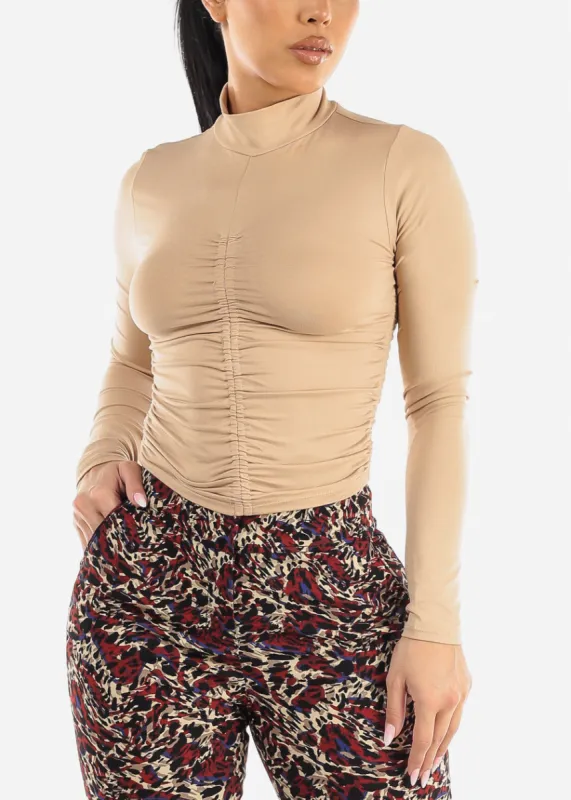 Long Sleeve Front Ruched Mock Neck Top Beige sold by Moda