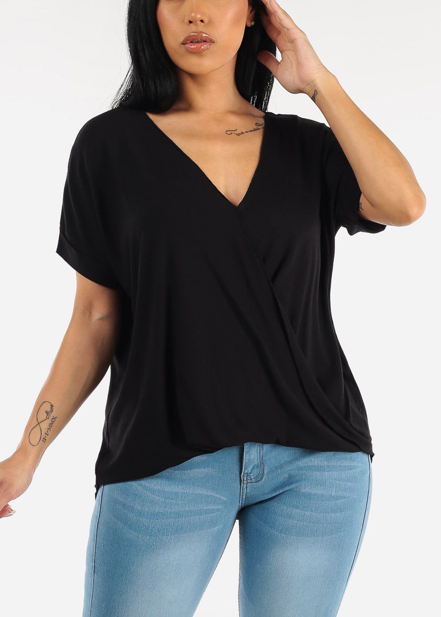Black Short Sleeve Surplice Tunic Top sold by Moda