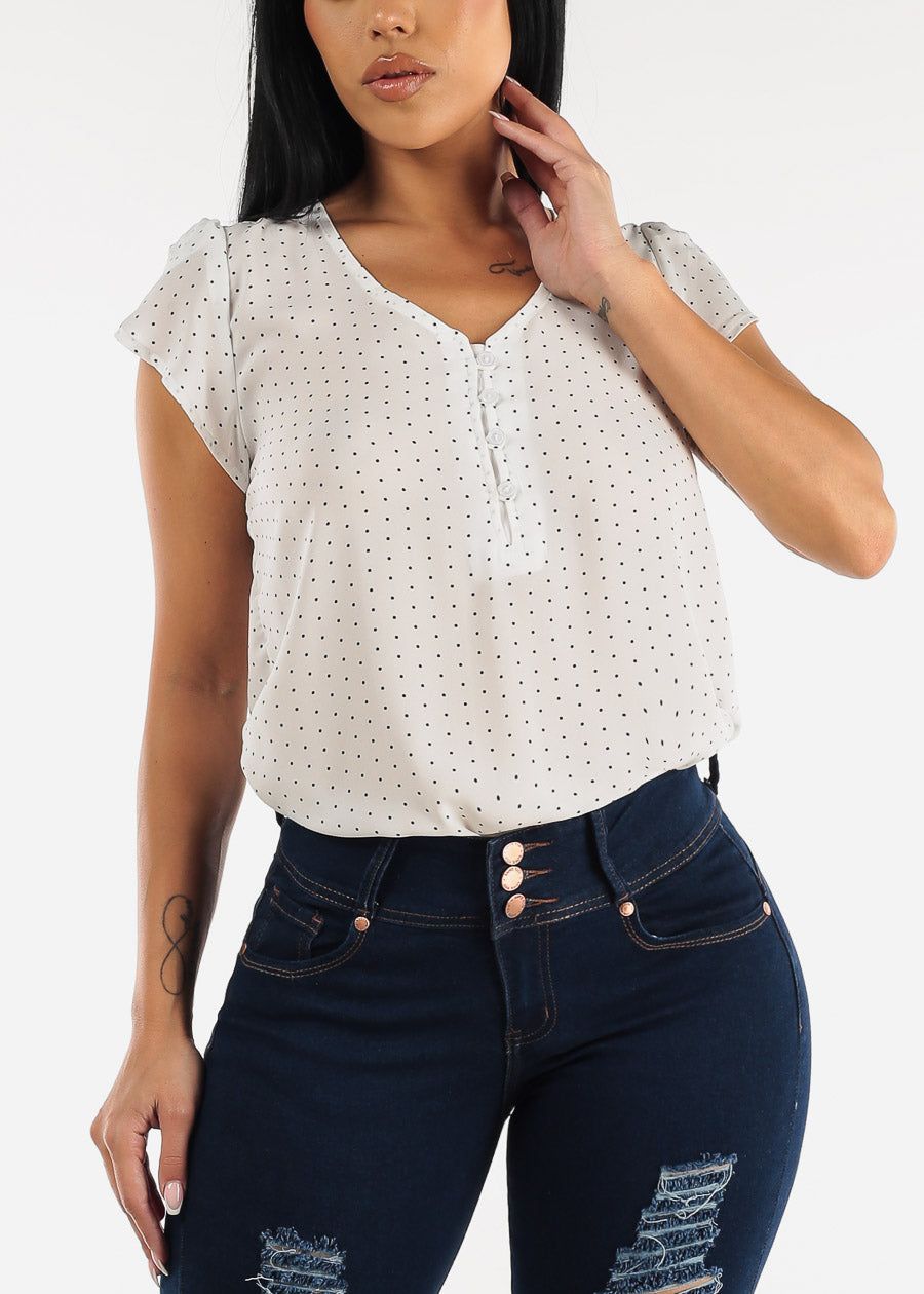White Short Sleeve Polka Dot Vneck Blouse sold by Moda