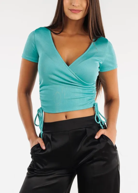 Short Sleeve Surplice Top Aqua w Ruched Sides sold by Moda